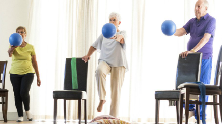 three people participating in a balance class